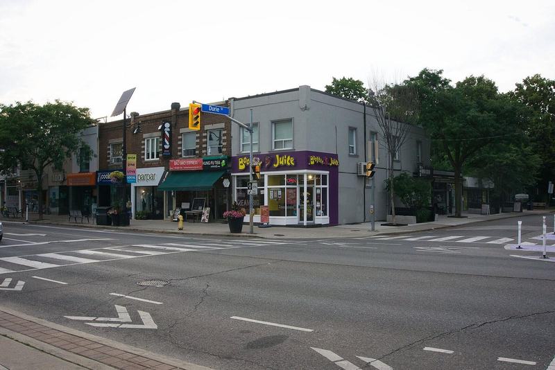 Shops and cafes at a Bloor Street West intersection in Bloor West Village, Toronto
