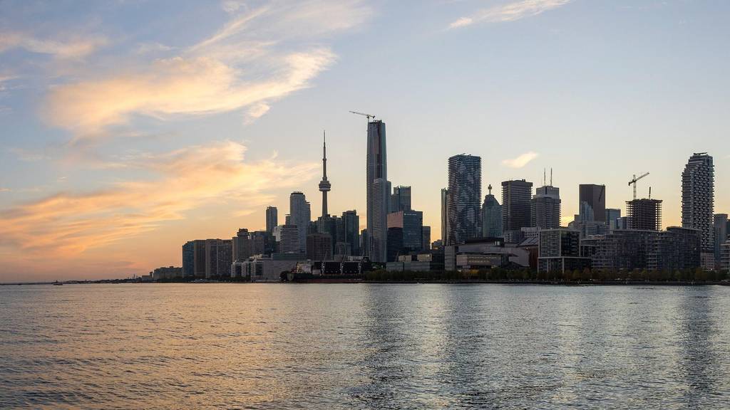 Toronto skyline at sunset seen across the water